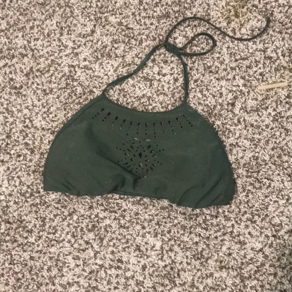 Halter swim top by Malibu. Has cups for support